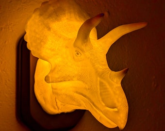 Triceratops inspired wall trophy lamp to decorate your room: bedroom, playroom or office.