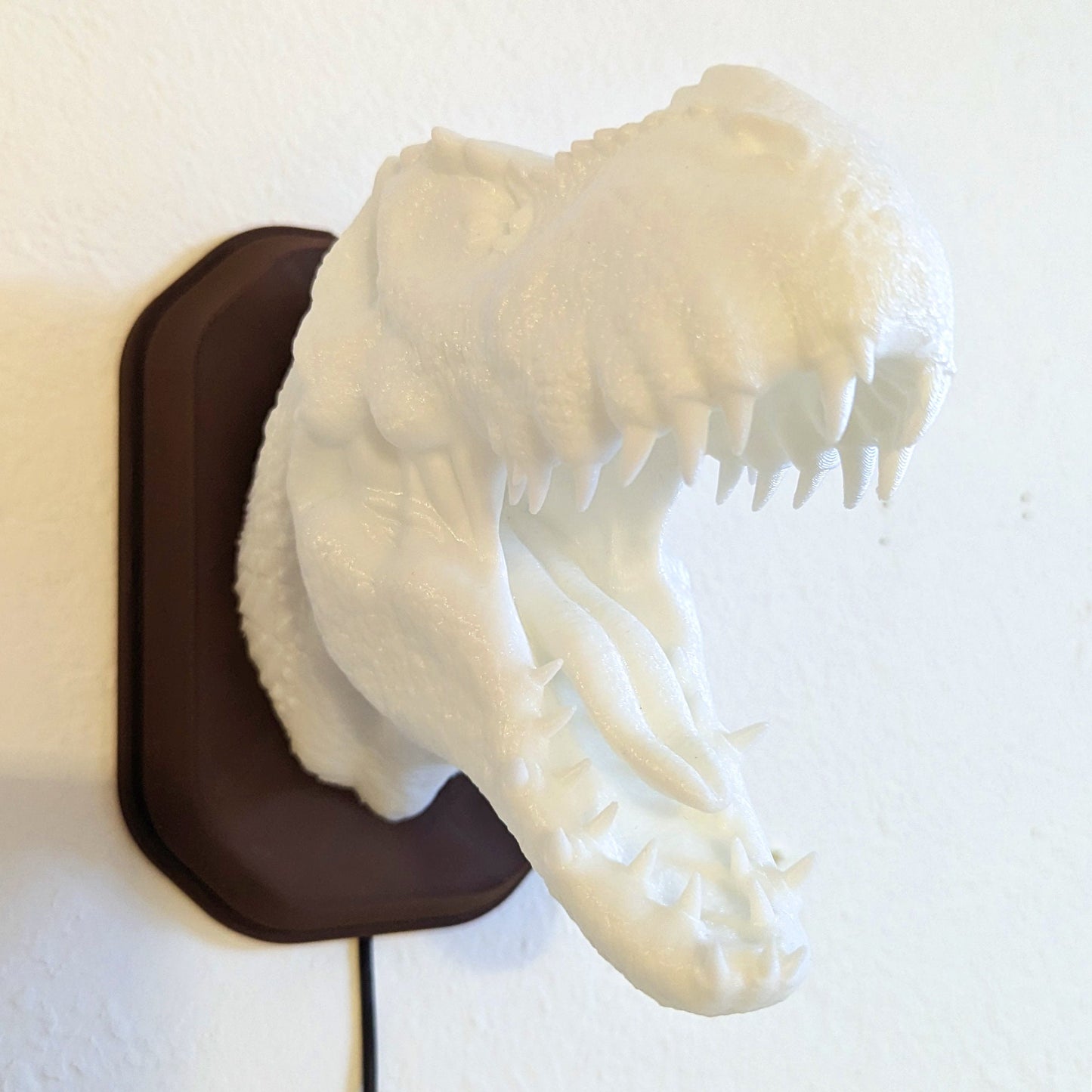 Tyrannosaurus rex T-Rex inspired wall trophy lamp to decorate your room: bedroom, playroom or office.