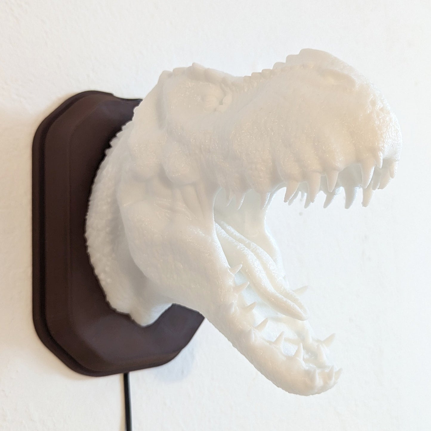 Tyrannosaurus rex T-Rex inspired wall trophy lamp to decorate your room: bedroom, playroom or office.