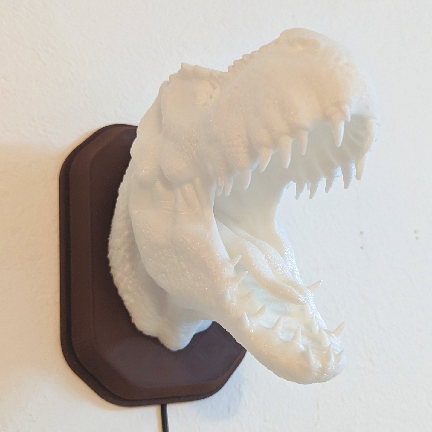 Tyrannosaurus rex T-Rex inspired wall trophy lamp to decorate your room: bedroom, playroom or office.