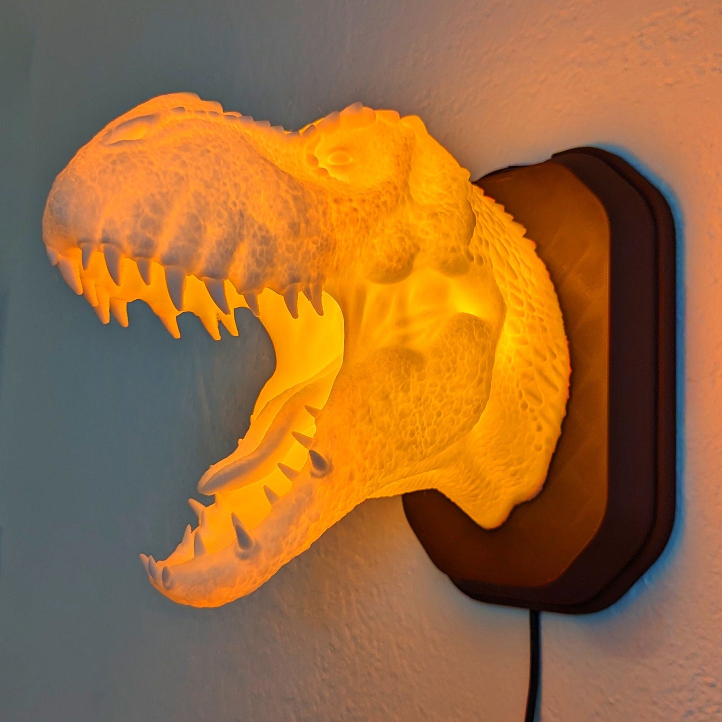 Tyrannosaurus rex T-Rex inspired wall trophy lamp to decorate your room: bedroom, playroom or office.
