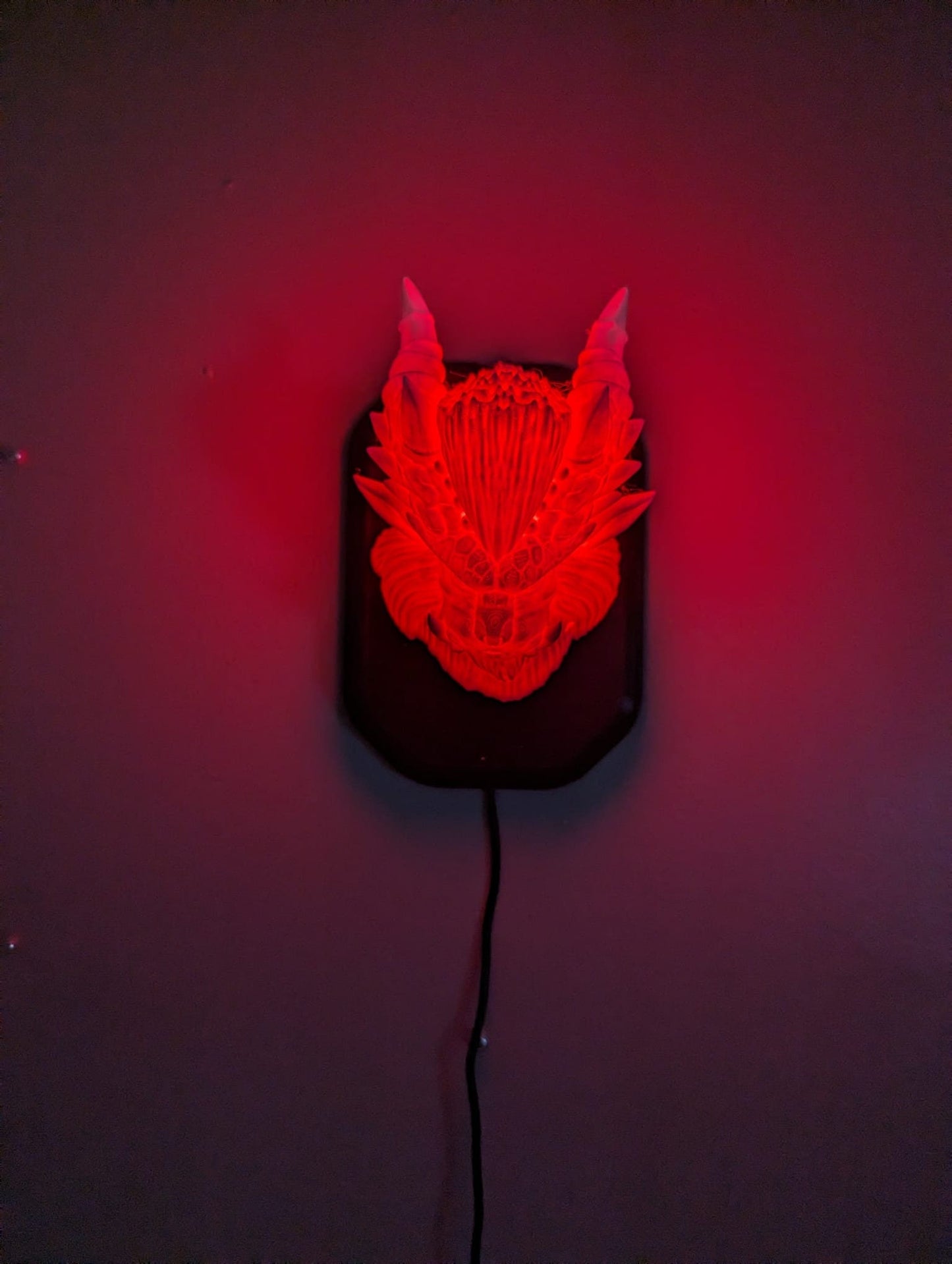Monster Hunter Teostra inspired wall trophy lamp to decorate your room: bedroom, playroom or office.