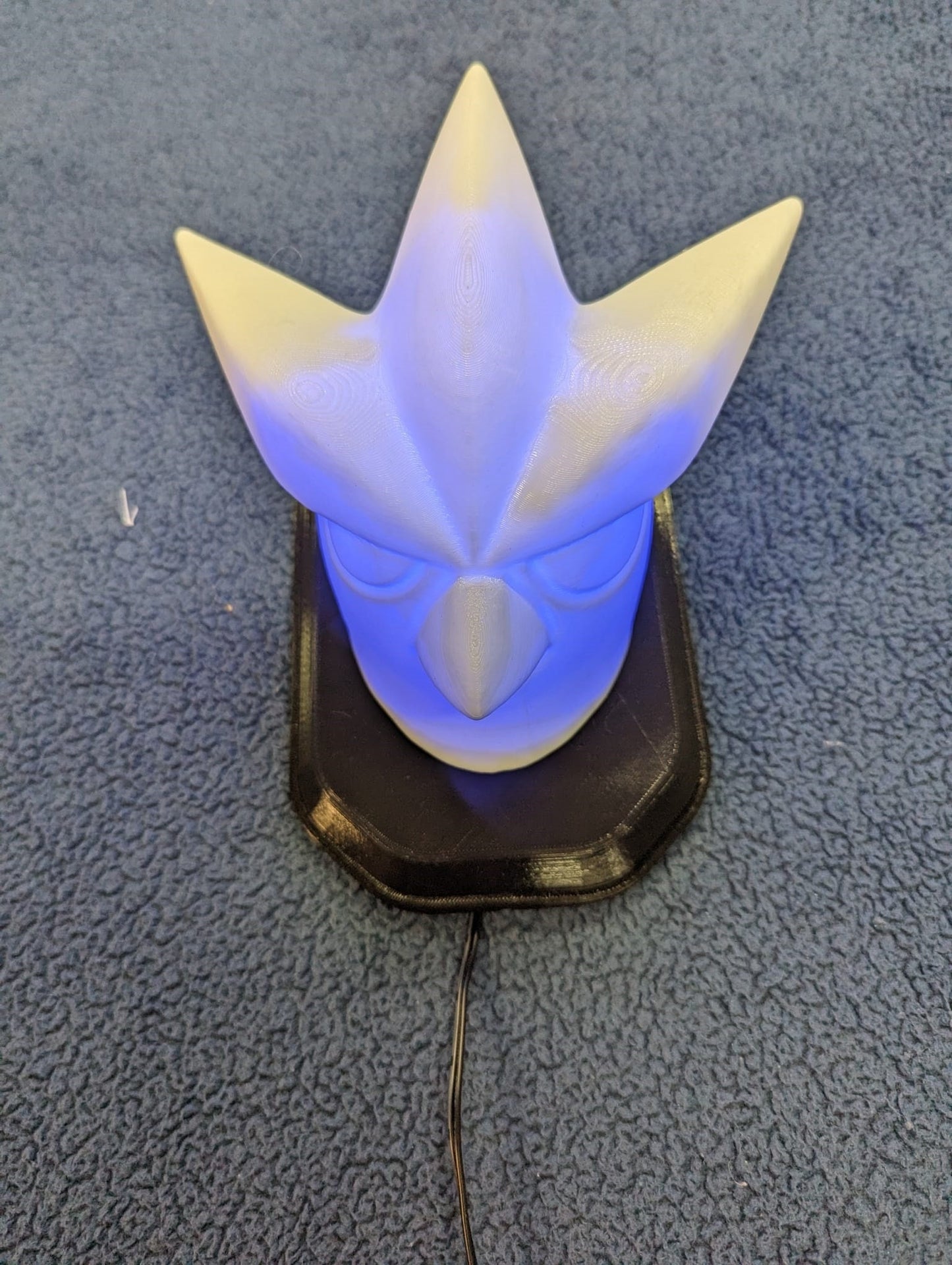 Pokemon's Artikuno inspired wall trophy lamp to decorate your room: bedroom, playroom or office.
