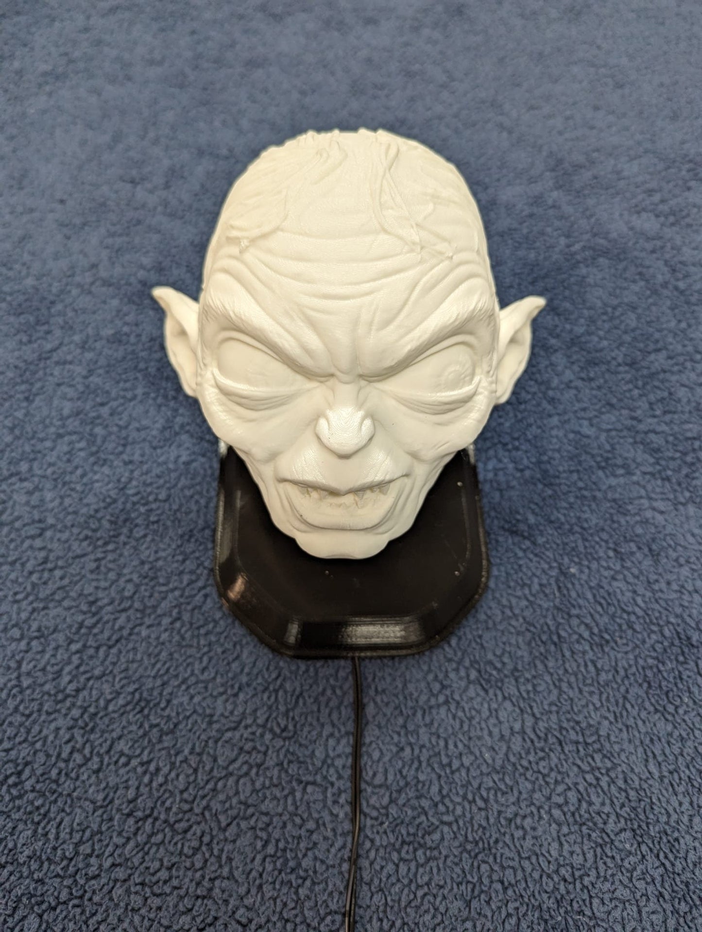 Lord of the Rings Golum inspired wall trophy lamp to decorate your room: bedroom, playroom or office.