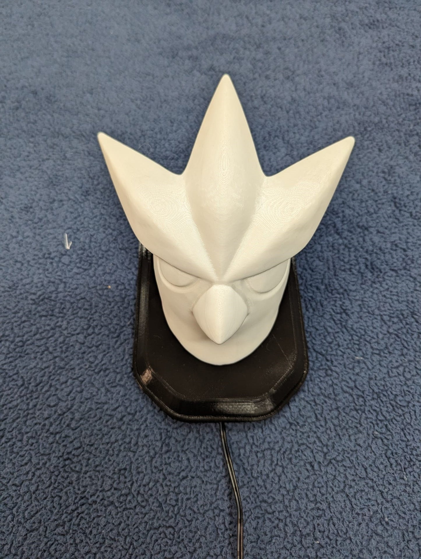 Pokemon's Artikuno inspired wall trophy lamp to decorate your room: bedroom, playroom or office.