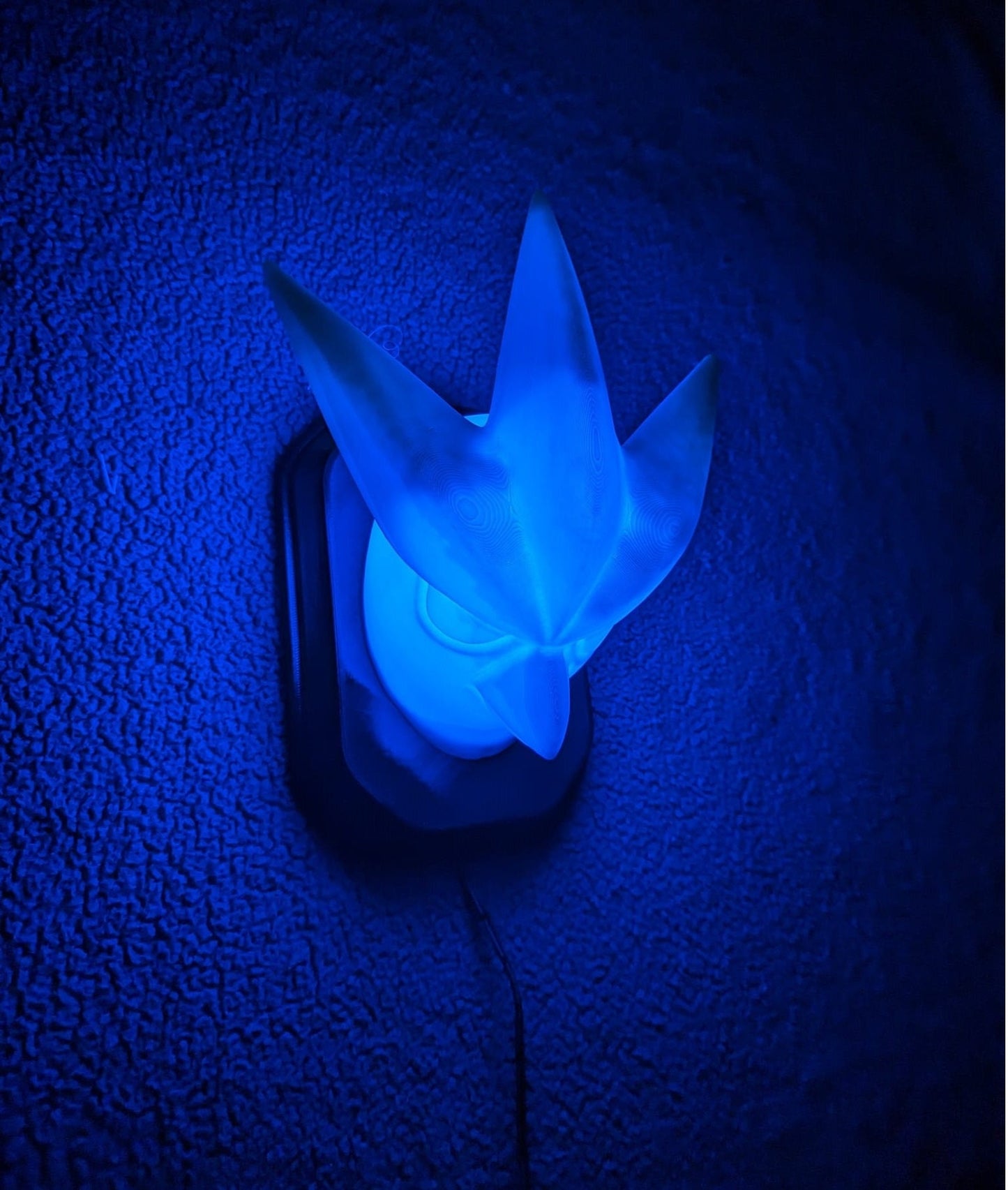 Pokemon's Artikuno inspired wall trophy lamp to decorate your room: bedroom, playroom or office.