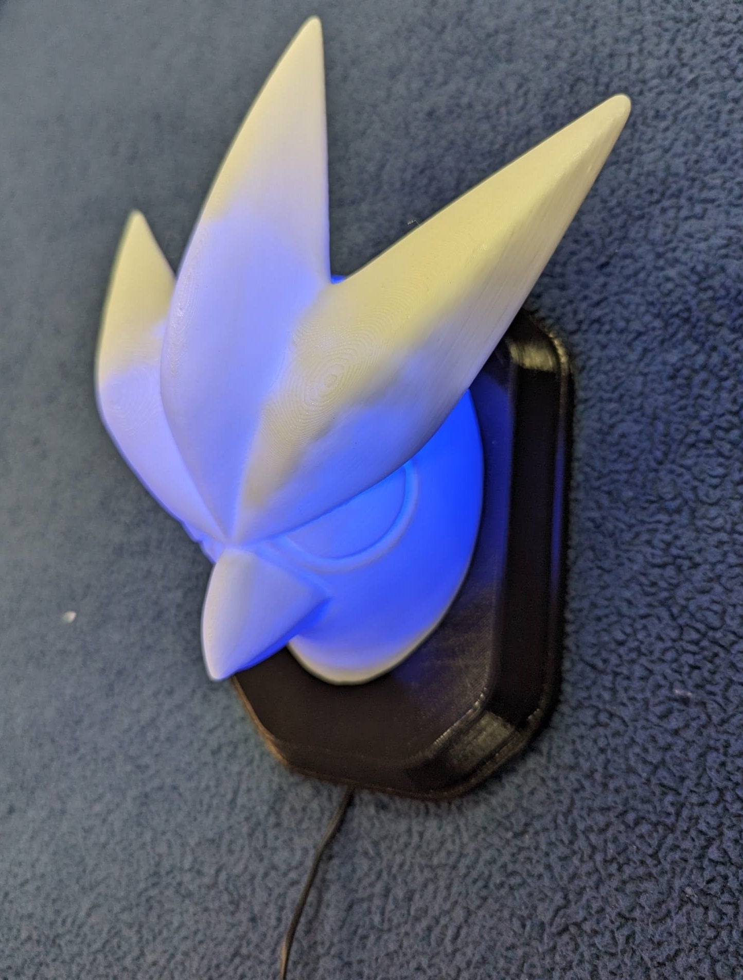 Pokemon's Artikuno inspired wall trophy lamp to decorate your room: bedroom, playroom or office.