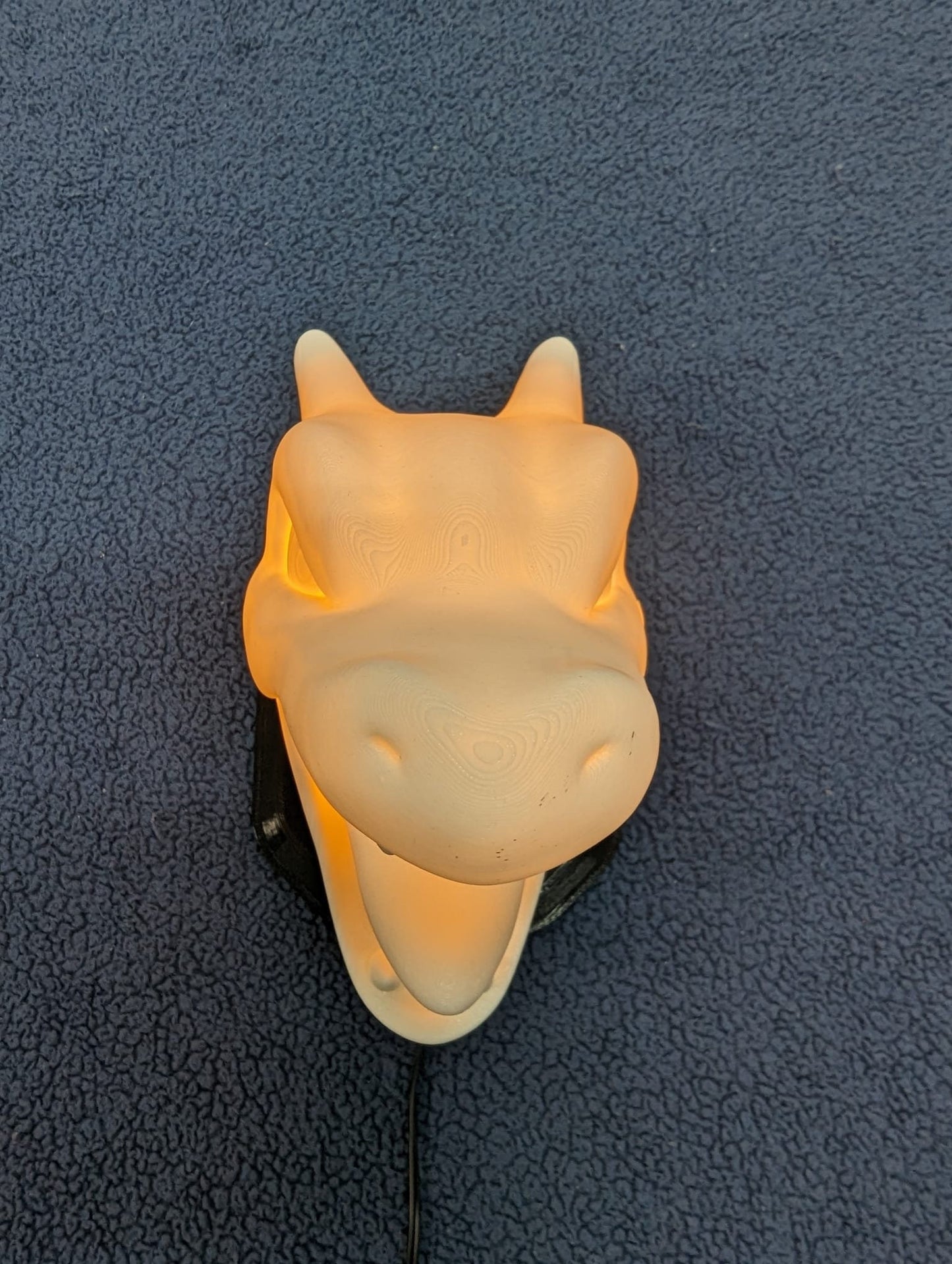 Pokemon's Charizard inspired wall trophy lamp to decorate your room: bedroom, playroom or office.