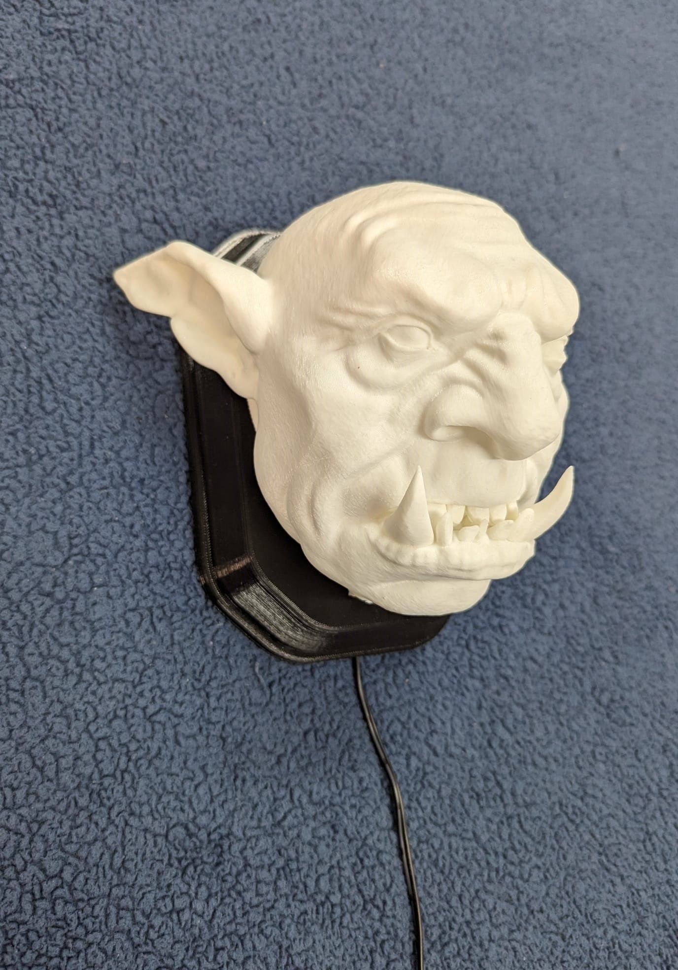 Cave Troll Head wall trophy lamp to decorate your room: bedroom, playroom or office.