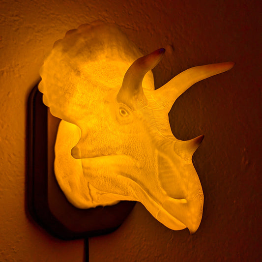 Triceratops inspired wall trophy lamp to decorate your room: bedroom, playroom or office.