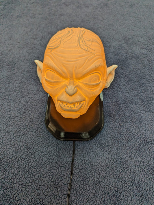 Lord of the Rings Golum inspired wall trophy lamp to decorate your room: bedroom, playroom or office.