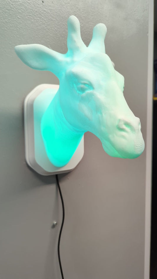 Giraffe-inspired wall trophy lamp to decorate your room: bedroom, game room or office.