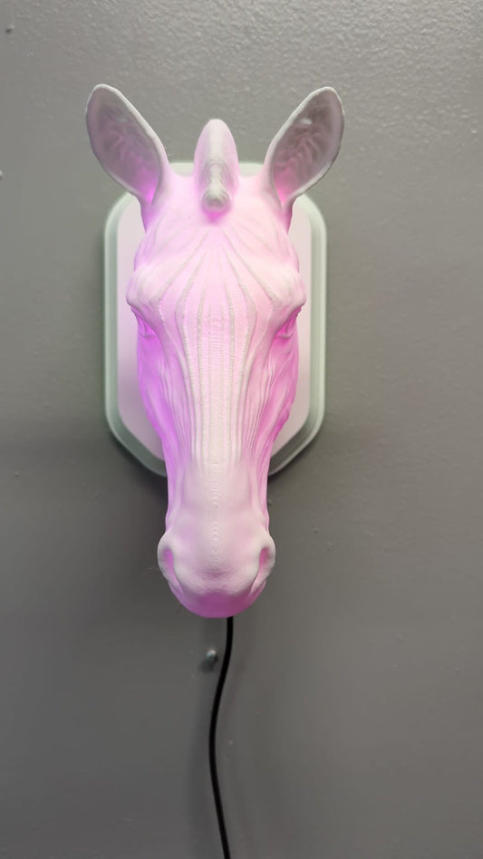 Zebra-inspired wall trophy lamp to decorate your room: bedroom, game room or office.